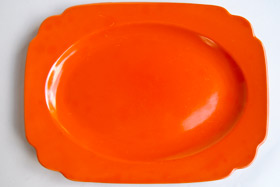 Original Radioactive Red RIviera Pottery Oval Well Platter with Tab Handles
Original Radioactive Red RIviera Pottery Oval Well Platter with Tab Handles