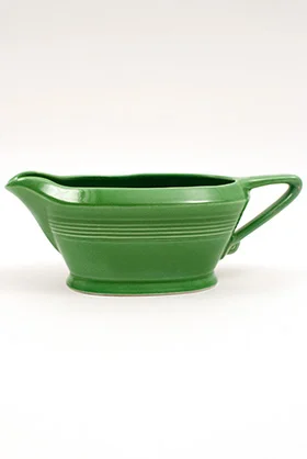 rare vintage harlequin medium green sauce or gravy boat made by Homer Laughlin for Woolworths in 1959
