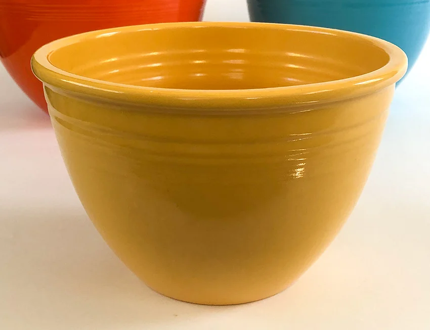 yellow vintage fiesta number 4 mixing bowl with inside bottom rings