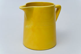  Vintage Harlequin Original Yellow 22 ounce jug or milk pitcher: Harlequin Dinnerware 30s 40s American Solid Color Dinnerware For Sale       