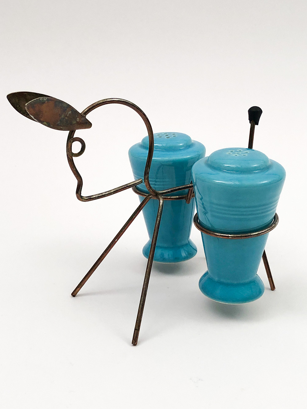 turquoise harlequin shakers in original metal donkey holder