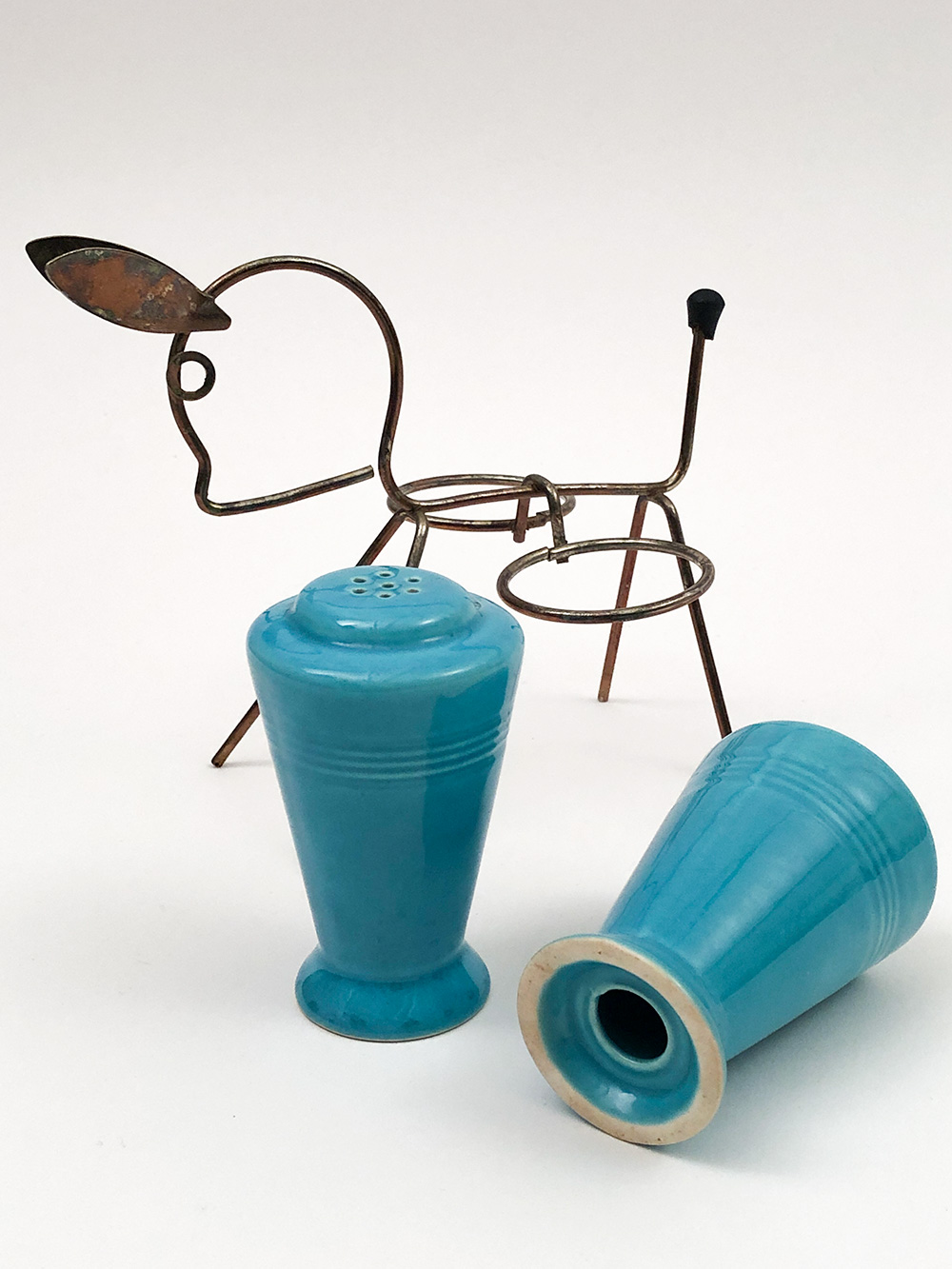 turquoise harlequin shakers in original metal donkey holder