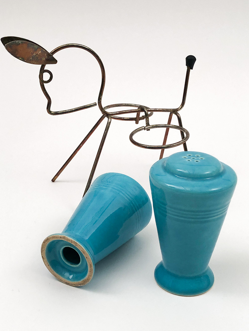 turquoise harlequin shakers in original metal donkey holder