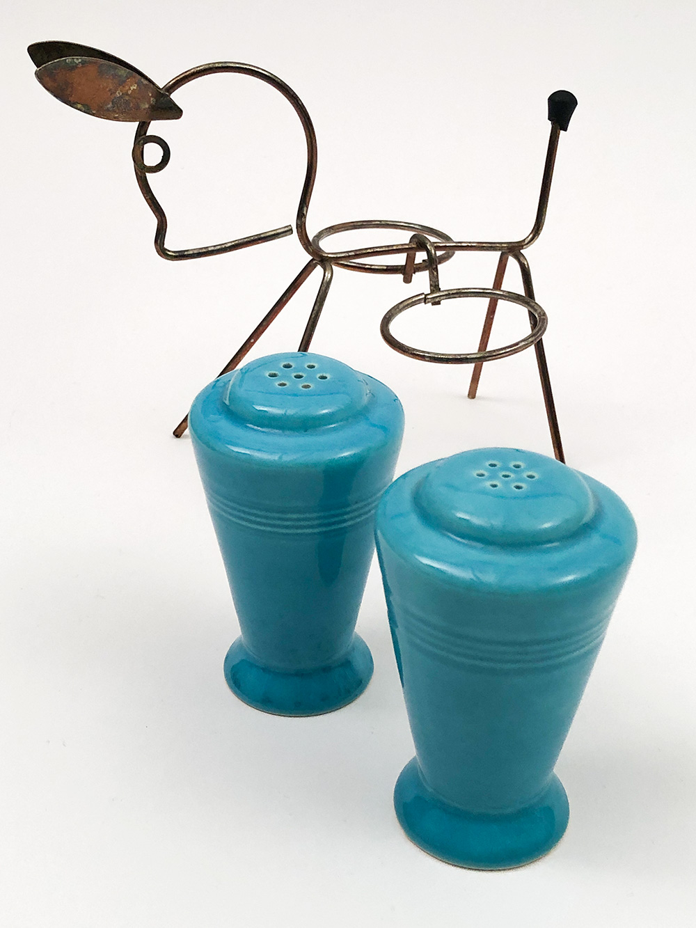 turquoise harlequin shakers in original metal donkey holder
