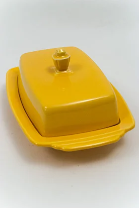 Yellow vintage Harlequin half pound butter dish made by Homer Laughlin for Woolworths