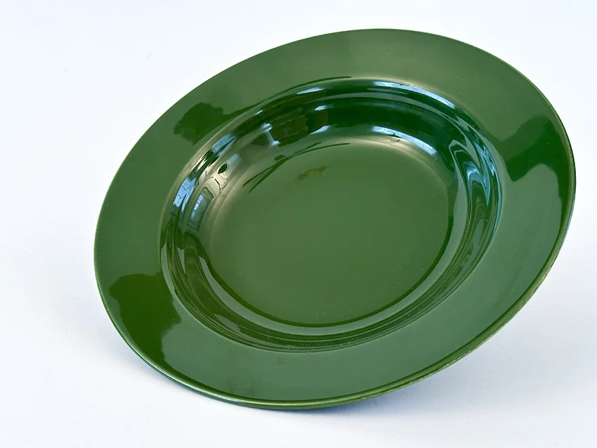 forest green vintage harlequin dinnerware deep plate made by Homer Laughlin for Woolworths