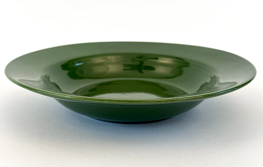 forest green vintage harlequin dinnerware deep plate made by Homer Laughlin for Woolworths