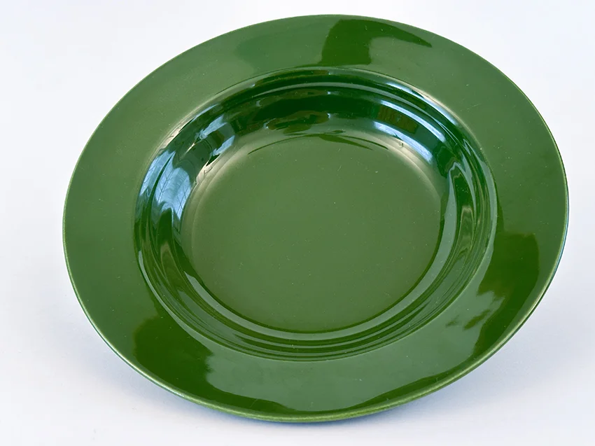 forest green vintage harlequin dinnerware deep plate made by Homer Laughlin for Woolworths