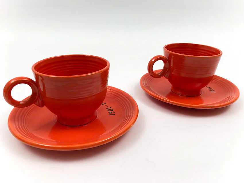 pair red vintage fiesta flat bottomed teacup and saucer sets with mother father 1936 decals