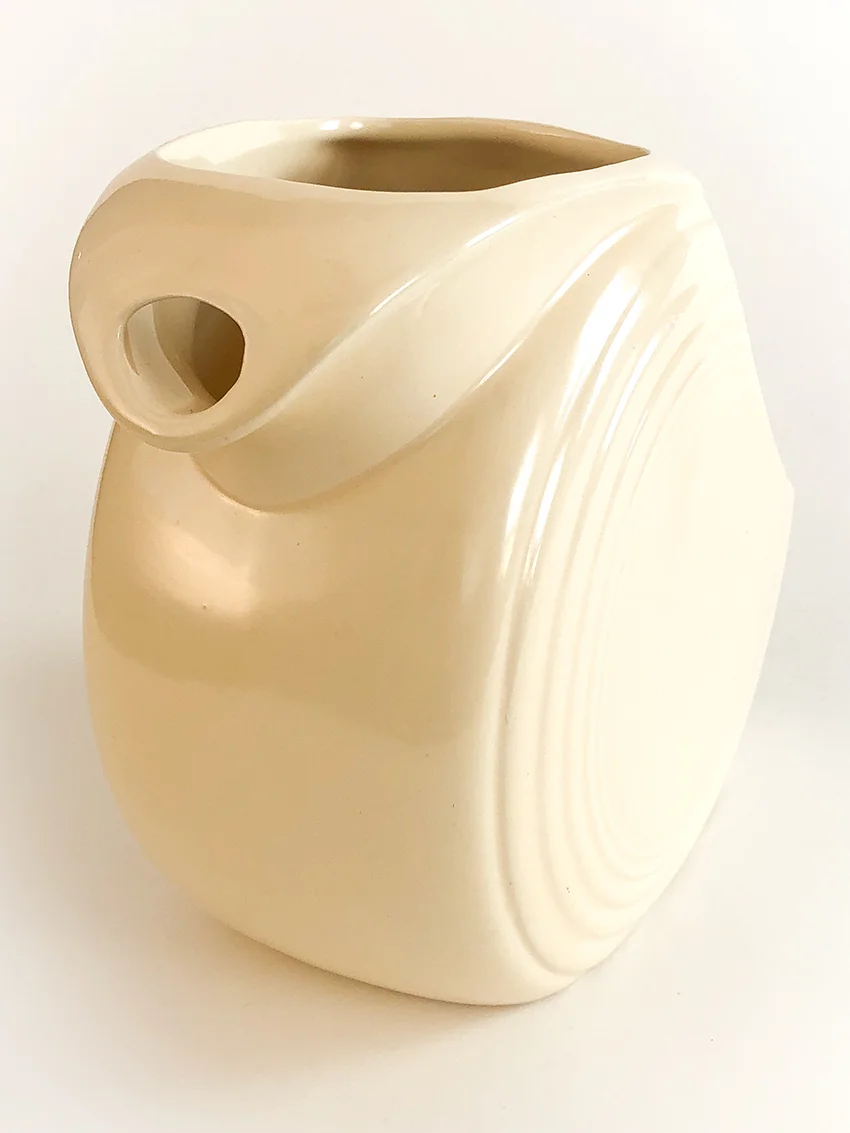 ivory fiesta disc water pitcher