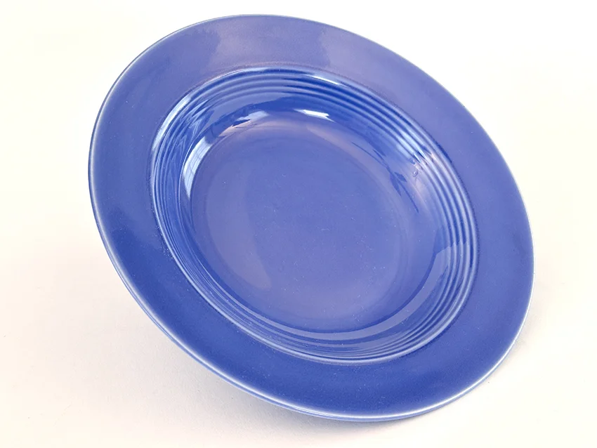 mauve blue vintage harlequin dinnerware deep plate made by Homer Laughlin for Woolworths