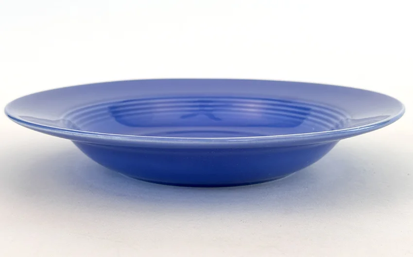 mauve blue vintage harlequin dinnerware deep plate made by Homer Laughlin for Woolworths