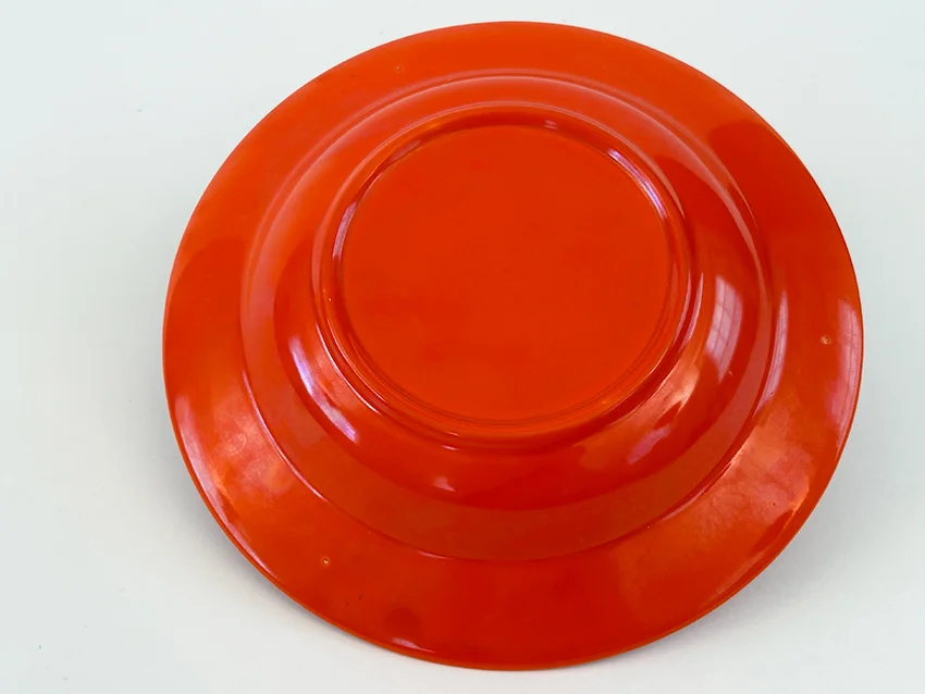 Red vintage harlequin dinnerware deep plate made by Homer Laughlin for Woolworths