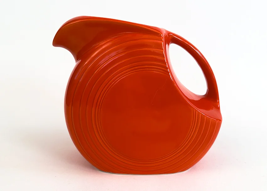 red fiesta disc water pitcher