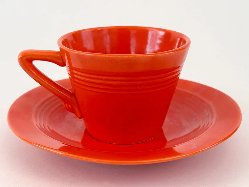 original radioactive red harlequin demitasse cup and saucer set for sale