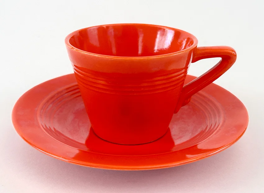 original radioactive red harlequin demitasse cup and saucer set for sale