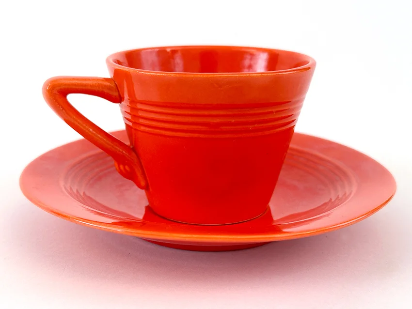 original radioactive red harlequin demitasse cup and saucer set for sale