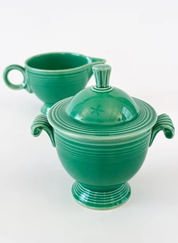 Vintage Fiestaware Sugar Bowl and Ring Handled Creamer Set in Original Green Glaze For Sale