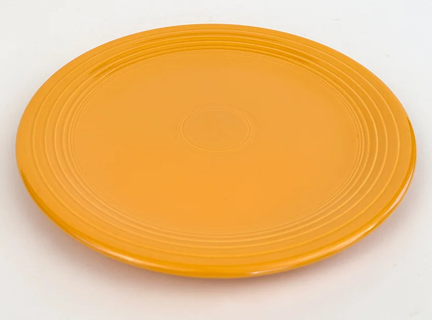 yellow vintage feistaware 13 inch chop plate for sale