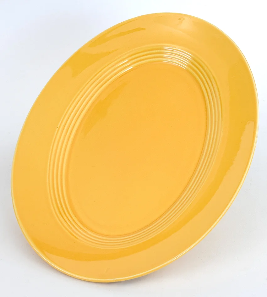 yellow vintage harlequin 11 inch platter