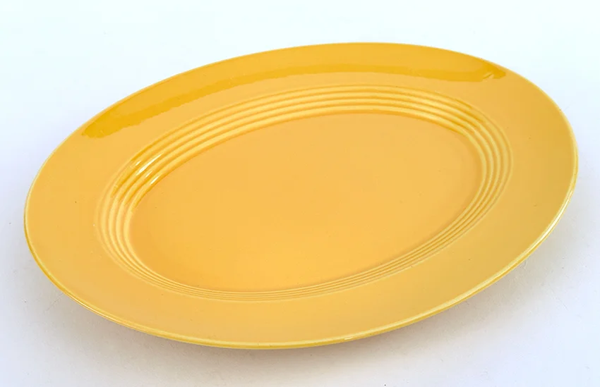 yellow vintage harlequin 11 inch platter