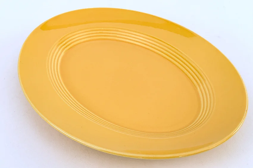 yellow vintage harlequin 11 inch platter