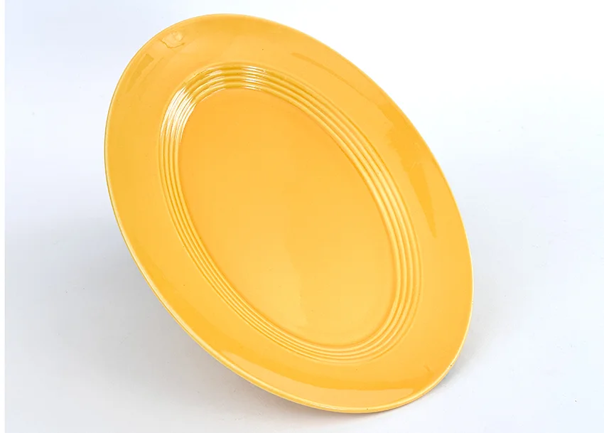 yellow vintage harlequin 11 inch platter