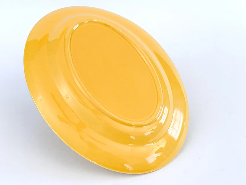 yellow vintage harlequin 11 inch platter