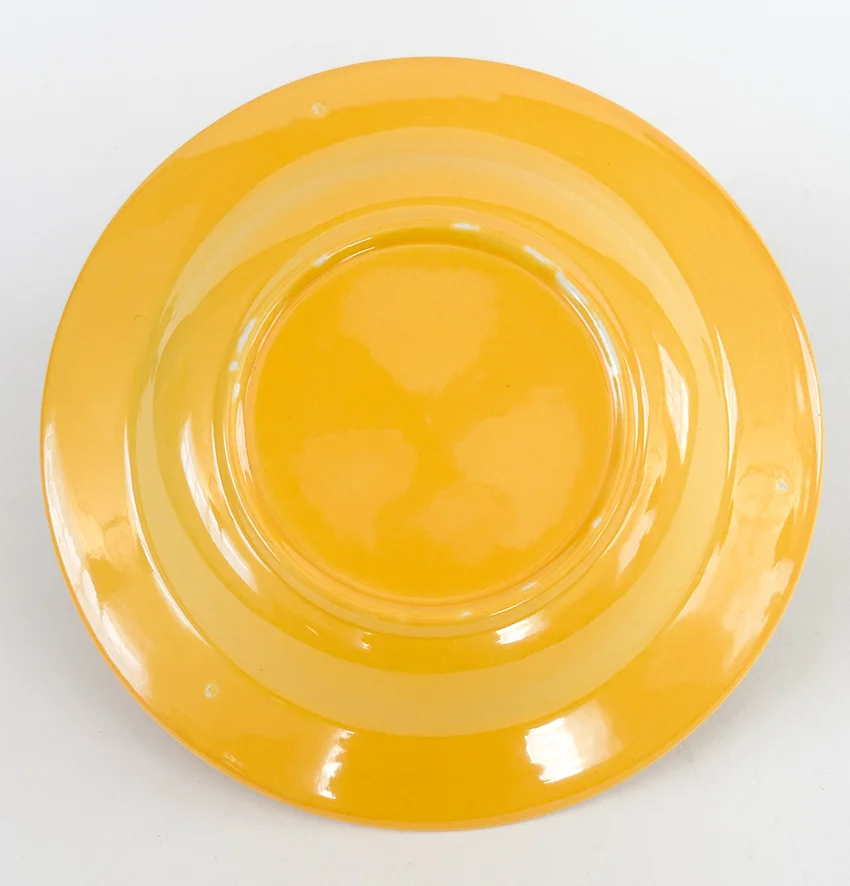 yellow vintage harlequin dinnerware deep plate made by Homer Laughlin for Woolworths