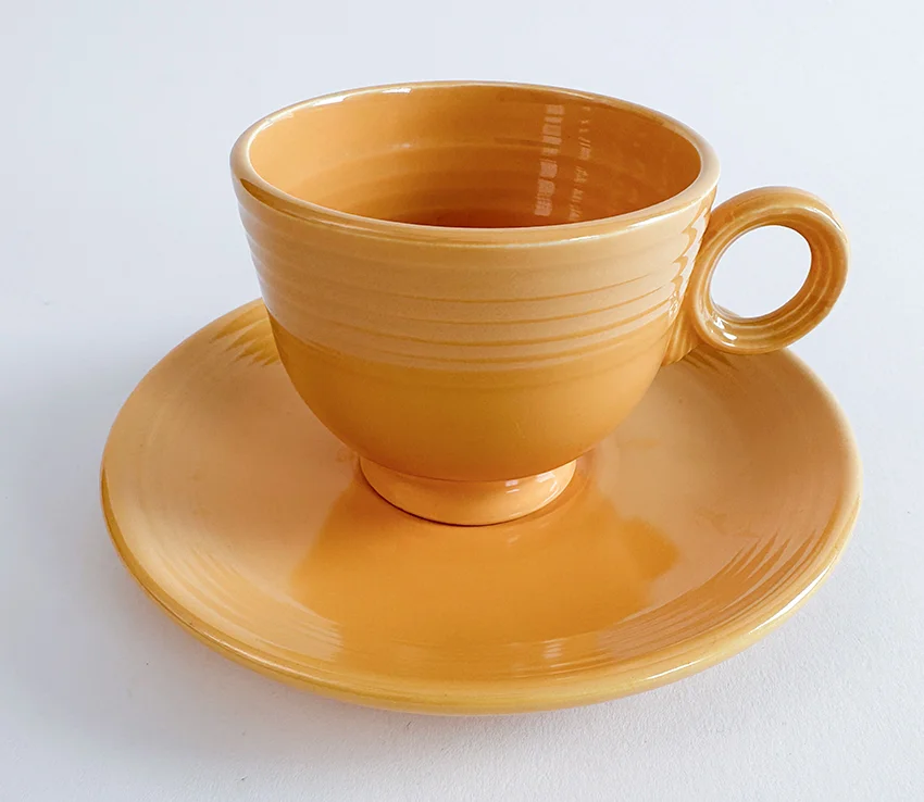 yellow vintage fiesta teacup and saucer set