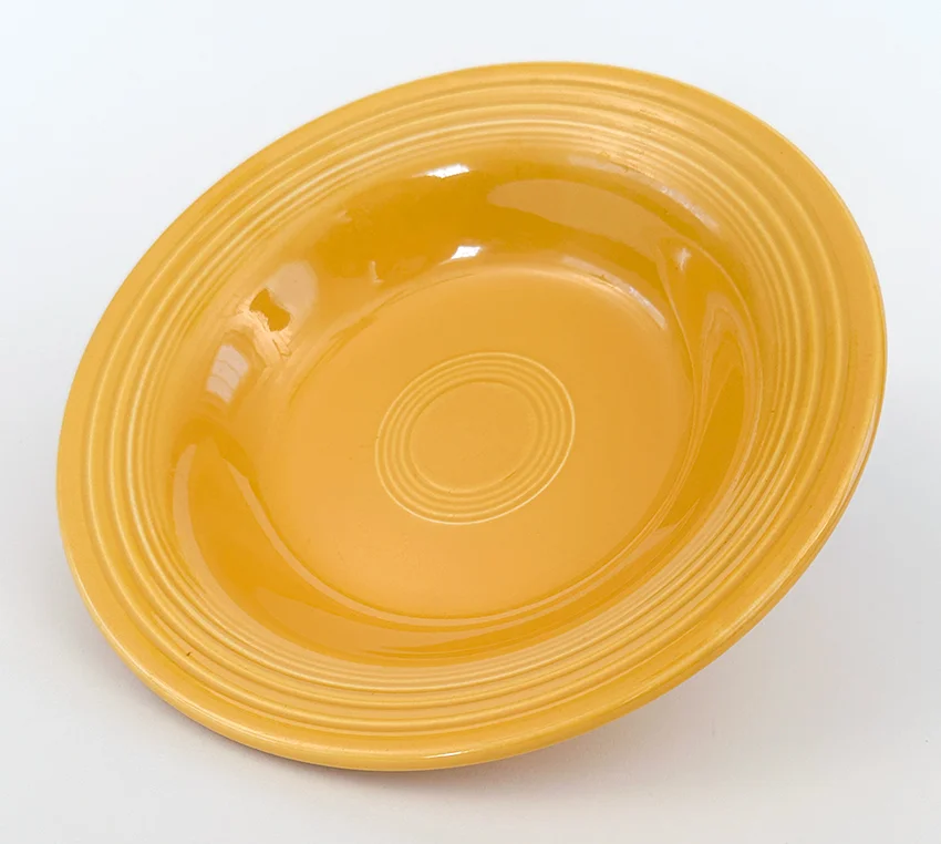 yellow vintage fiestaware deep plate