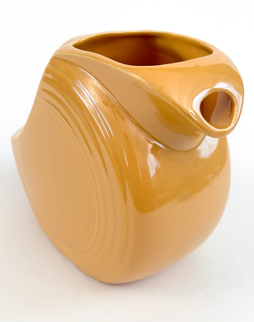 yellow vintage fiestaware disk water pitcher for sale made from1938-1959