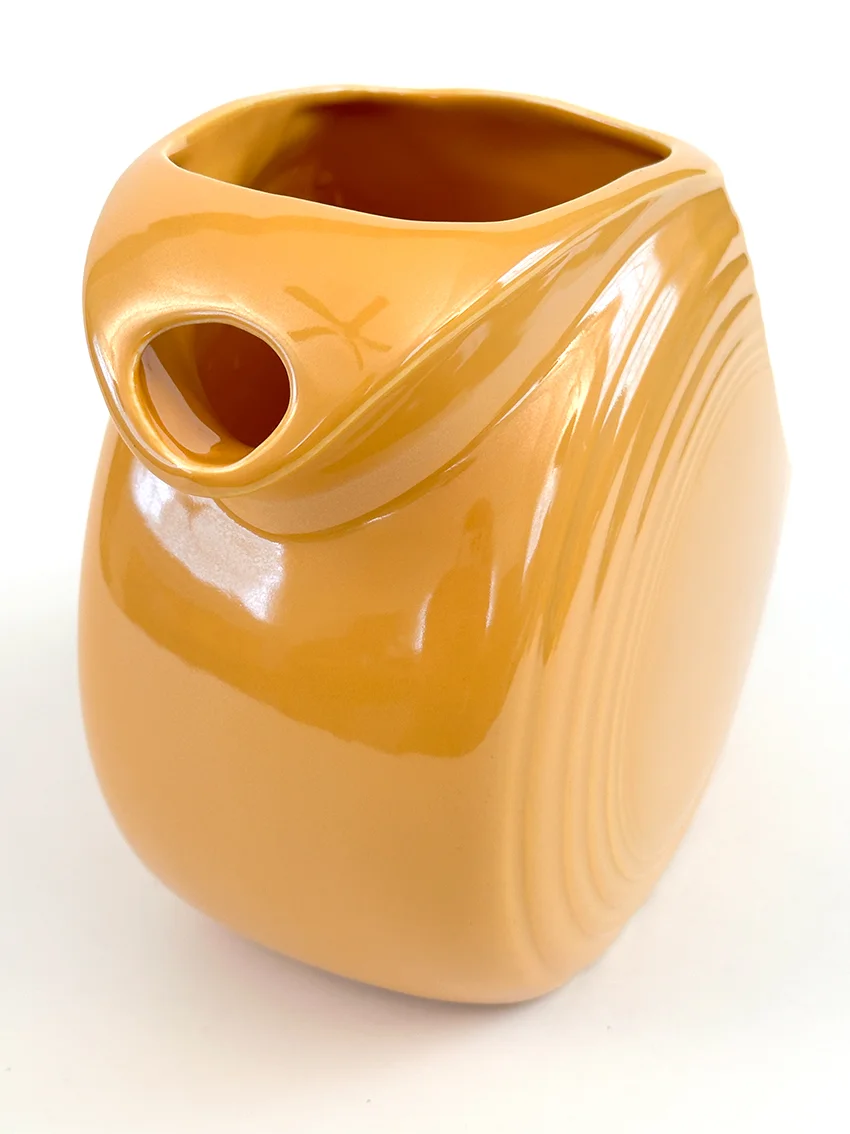 yellow vintage fiestaware disk water pitcher for sale made from1938-1959