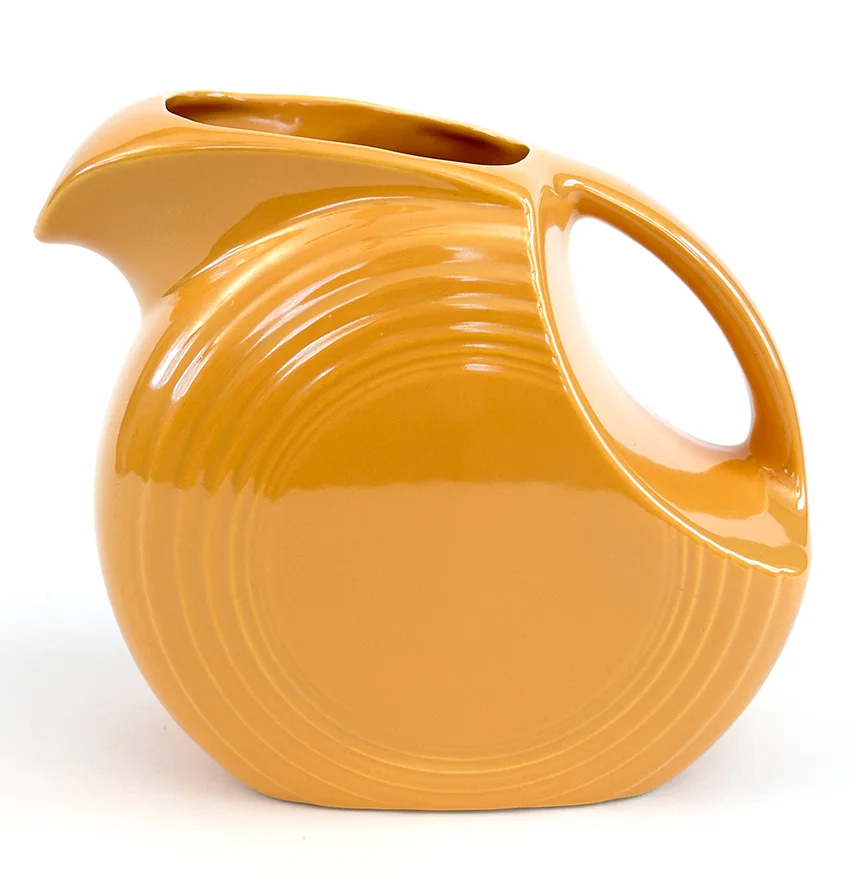 yellow vintage fiestaware disk water pitcher for sale made from1938-1959