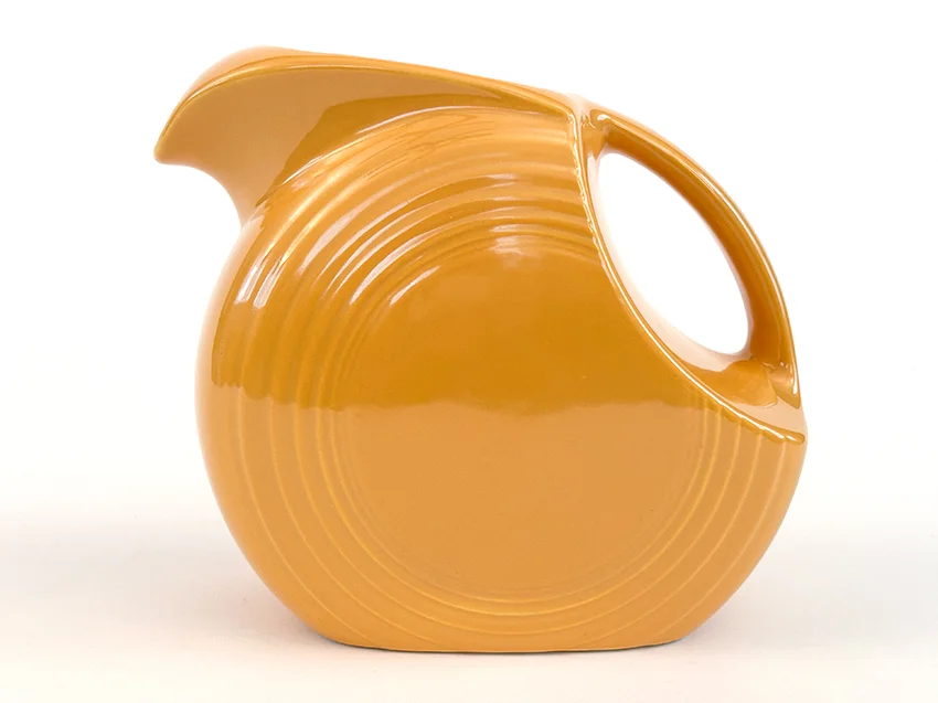 yellow vintage fiestaware disk water pitcher for sale made from1938-1959