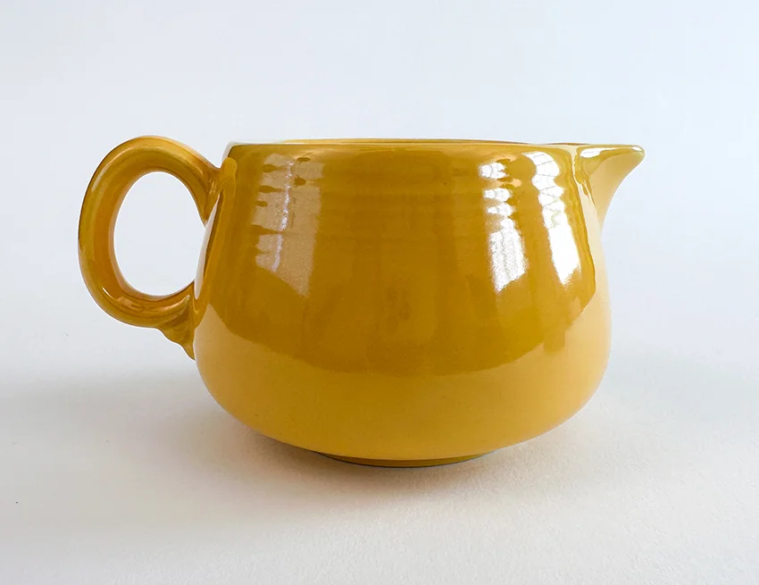 Yellow vintage fiesta promotional campaign individual creamer